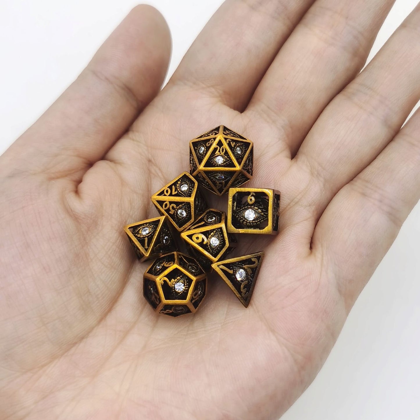 Hollow 10mm mini Dragon's Eye dice set-Ancient Gold with Clear Gems