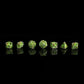 Skull's Grin Hollow Metal Dice Set-Glow in the dark green