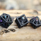Black with Chromatic Skull's Grin Hollow Metal Dice