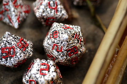 Silver with Red Pile of Skulls Solid Metal Dice Set
