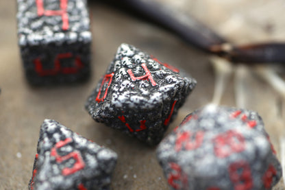 Dark Metal with Red Pile of Skulls Solid Metal Dice Set
