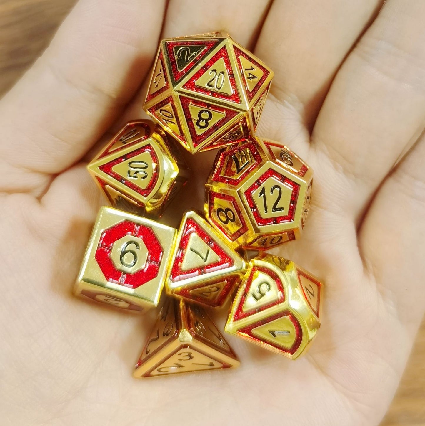 Leyline Gold with Ruby Metal D&D dice set