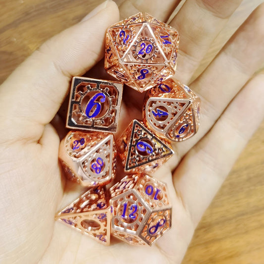 Copper with blue hollow gear cage dice set