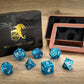 Peacock blue dnd dice set with hollow steampunk gear cage design - HYMGHO Dice 